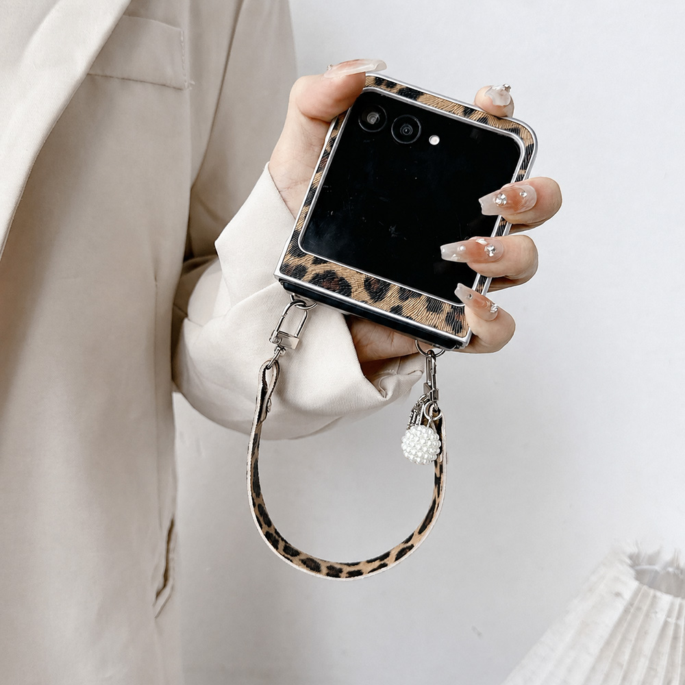 Etui na telefon składany z mot – Camera Wrist Strap recenzja i cena